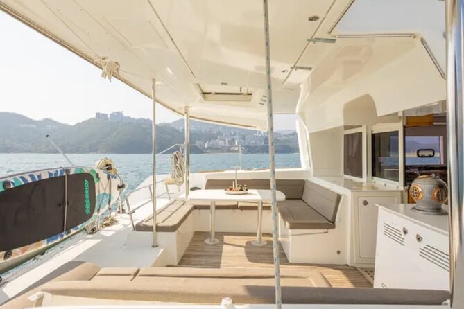 Athens Catamaran Half Day Semi Private Cruise Tour - How Fleves works: swim time with clear water and snack pacing