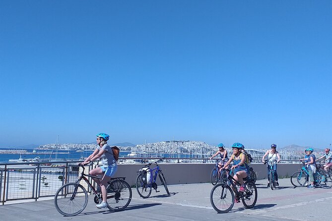 Athens City and Sea bike tour - Roman Agora stops: Tower of the Winds, Gate details, and an Ottoman survivor