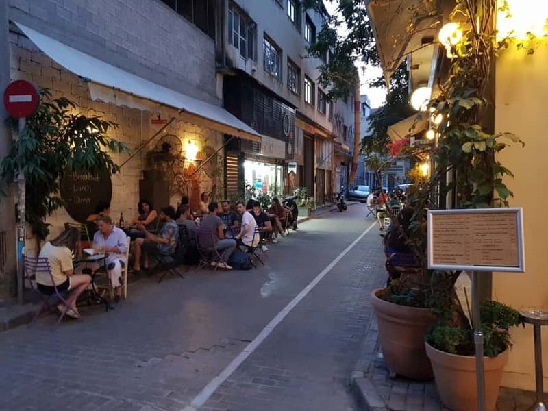 Athens: Discover the City Electric Bike Night Tour - Kolonaki and Zappeion: moving uphill toward bigger views
