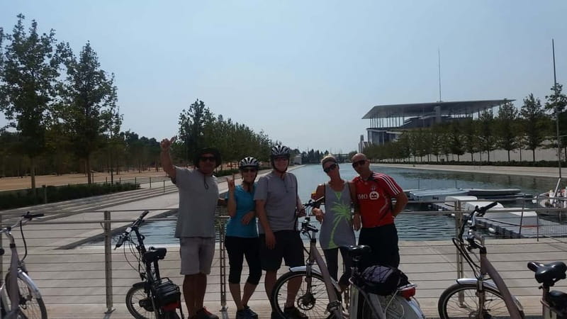 Athens: Electric Bike Seaside Tour with Guide - The first stops: Kerameikos and Stavros Niarchos (with real atmosphere)