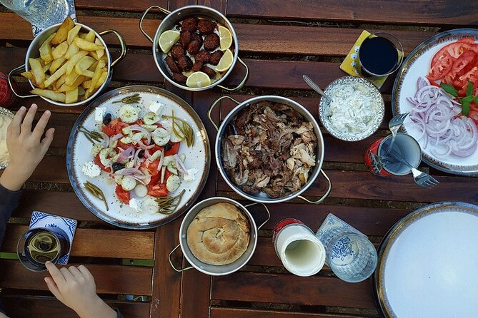 Athens Greek Cooking Class Pita Gyros from Scratch with a Local - Where the class feels like family: Panepistimiou 64 to the kitchen