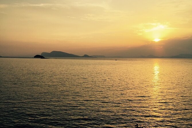 Athens: Island Swimming Day Cruise—DJ, Lunch & Drinks incl. - Agistri stop (1 hour 45): beach time that rewards the right shoes
