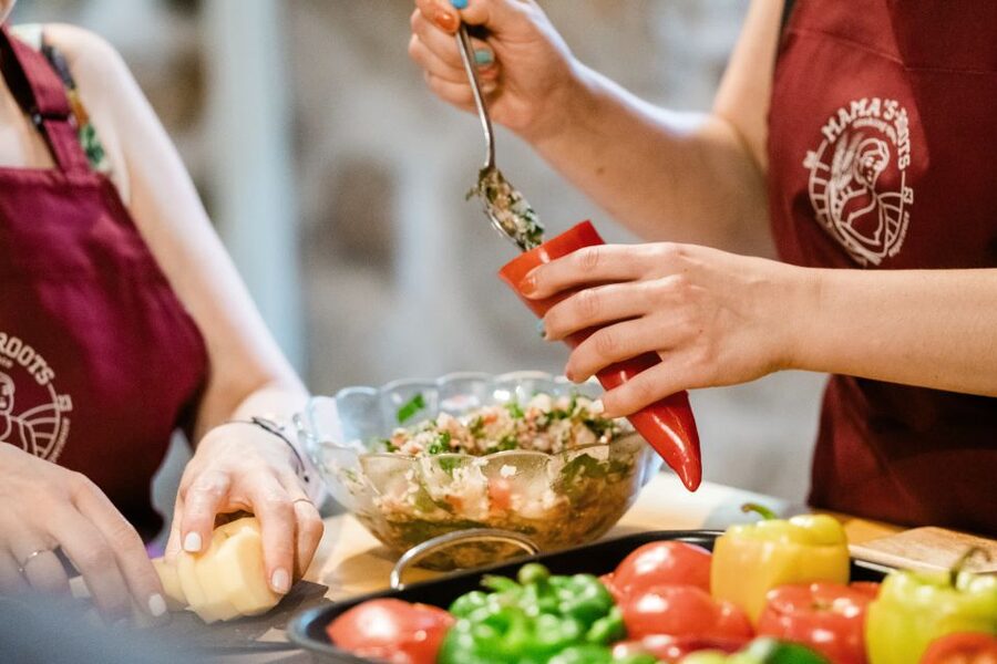 Athens: Kerameikos Stone House Cooking Class - From kitchen work to the garden table: meal flow and wine