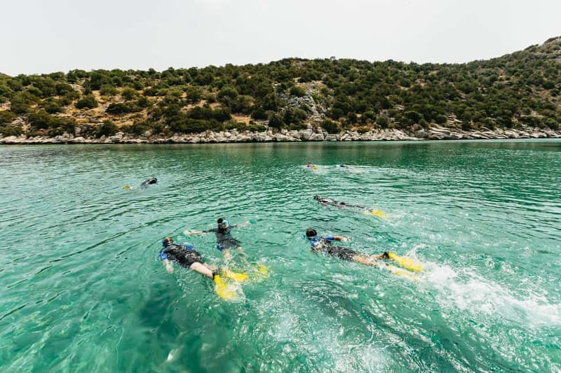 Athens, Nea Makri: Guided Small Group Snorkeling Boat Trip - Midday break at Marathon Cape: snacks, photos, and downtime
