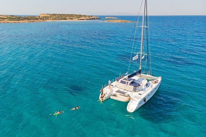 Athens Private Full day Catamaran cruise with meal & drinks - Starting at Istion Yachting in Alimos Marina (10:00 AM)