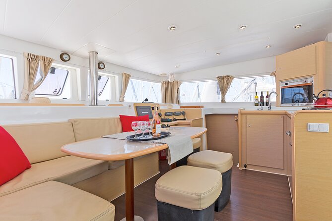 Athens Private Full day Catamaran cruise with meal & drinks - Lunch onboard: seafood pasta, salads, appetizers, and real downtime