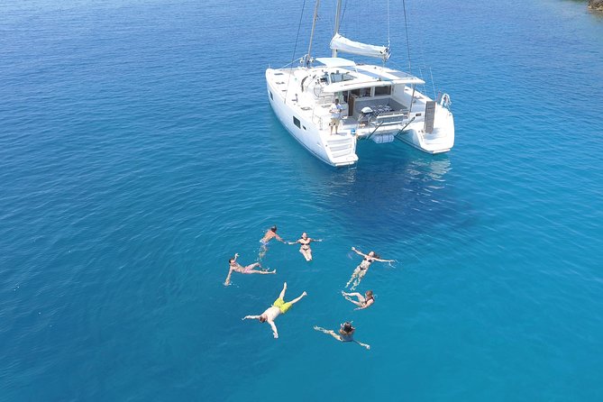 Athens Private Luxury Catamaran Cruise with Traditional Greek Meal and BBQ - Stop-and-sail rhythm: how the views and swim breaks work together