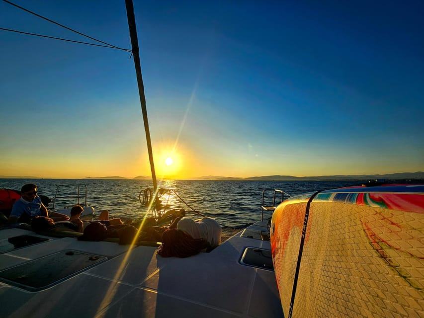 Athens: Riviera Catamaran Tour with Fresh Meal and Drinks - Vouliagmeni and Asteras Bay: calm water, easy swimming breaks