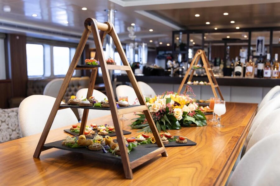 Athens: Saronic Islands Cruise with VIP Area Seating & Lunch - Onboard life: bars, lounges, dance show, and Wi‑Fi expectations
