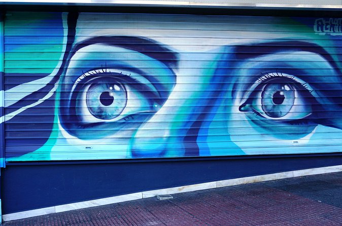 Athens Street Art - Private Walking Tour - Stop 3: Psyrri and the dog Loukanikos symbol