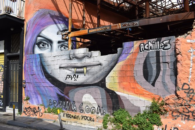Athens street art tour - Stop 1: Metaxourgio’s murals and the Owl of Athens