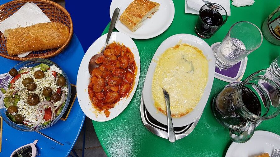 Athens: Traditional Greek food tour in hidden spots - Entering the Market World: Fish, Meat, Fruit, and Spice