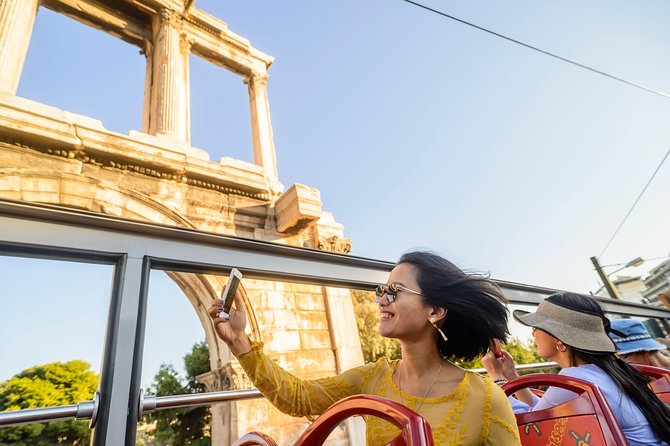 City Sightseeing Athens, Piraeus & Beach Riviera Hop-On Hop-Off Bus Tours - Ride tips that make the difference: headphones, stops, traffic, and vouchers
