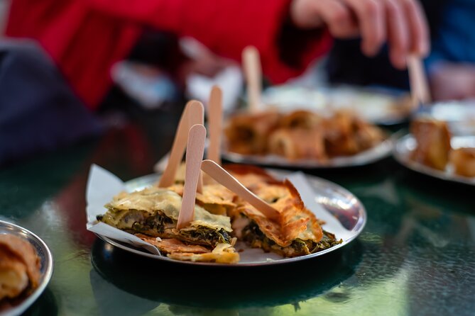 Eating Athens: Our Big, Fat, Greek Food Tour - The mural square stop: graffiti, craft history, and why it fits the food theme