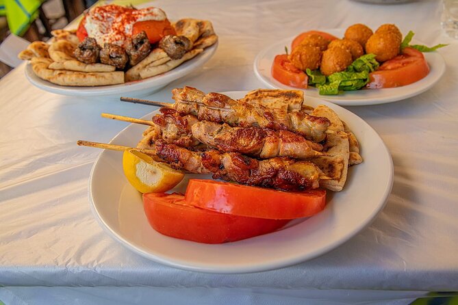 Feast on Athens: LGBTQ+ Walking Food Tour - Stop 4 Back in Monastiraki: Family-Style Lunch and Loukoumades