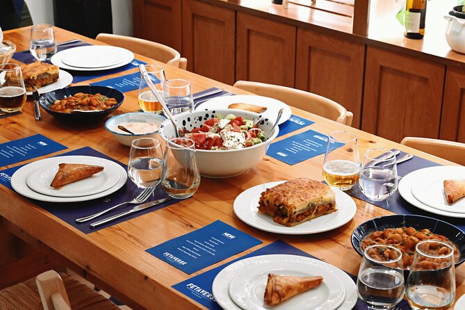 "Fetaverse" Private Cooking Class in Koukaki Athens - The dinner table: moussaka or giant beans, plus wine or beer