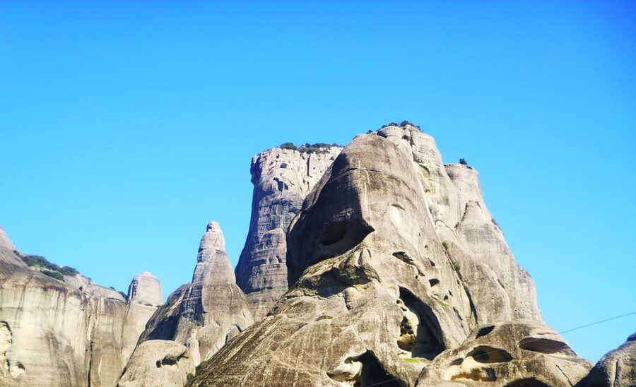 From Athens: Meteora Full-Day Trip with Guide on Luxury Bus - Meteora Photo Stop: The Moment the Rocks Hit You