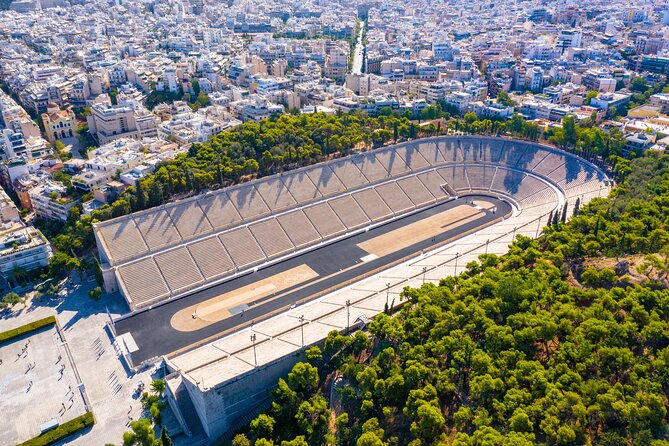 From Piraeus Port: Athens, Temple of Poseidon & Sounio Beach - The road past Olympian Zeus and Hadrian’s Arch: fast context from the bus