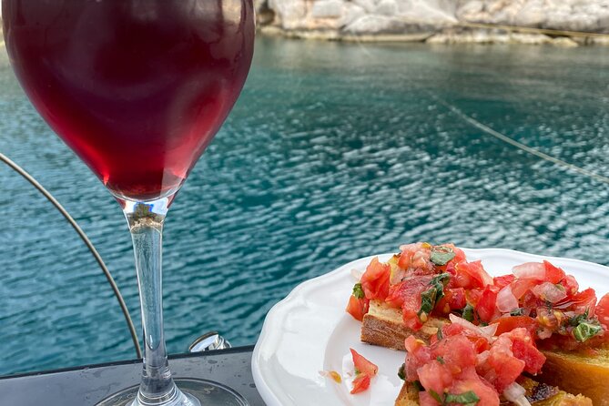 Greek Gastronomy & Wine Pairing Cruise with a Sommelier in Athens - The Boat, the Comfort, and the Sunset Energy