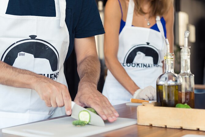 Greek Meze Cooking class and dinner with an Acropolis view - The Athens setting: CookinAthens near transit, with a view that changes the vibe
