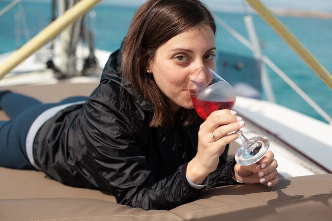Luxury Catamaran Sunset Private & Greek Gastronomy in Athens - Stop 2: Vouliagmeni Beach and On-Boat Greek Gastronomy