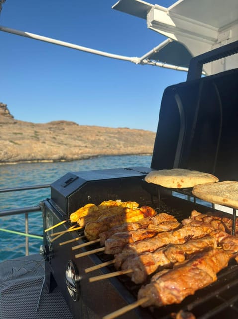 Porto Rafti: Athens Cruise Tour with Mediterranean BBQ - Stop-by-Stop: 4 Swim Breaks, Snorkeling Gear, and Real Time in the Water