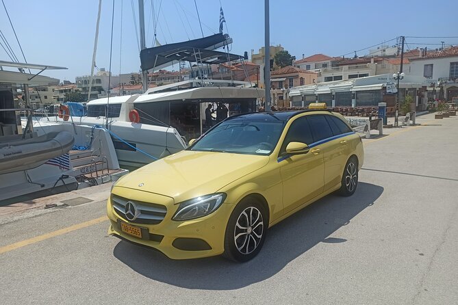 "Private Airport Transfer: Athens Airport to/from Piraeus Port" - Pickup at Athens Airport: name sign, flight monitoring, and meeting fast