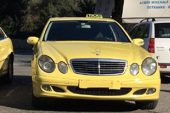 Private Arrival Transfer: Piraeus Cruise Port to Central Athens - The Ride Experience in the Car: Air-Conditioning, Help With Bags, and City Pointers