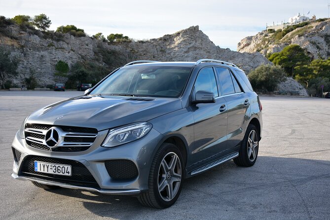 Private Transfer Athens International Airport to Athens Center - The chauffeur as your first-day Athens translator