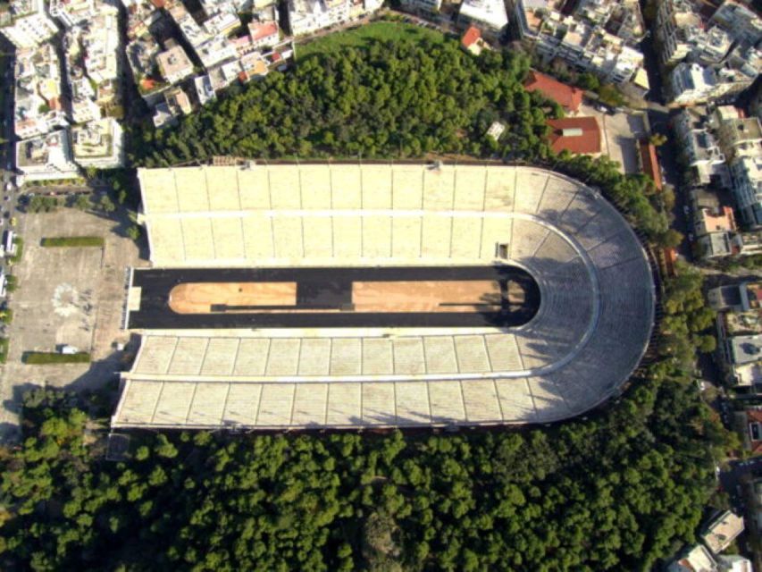 Running Through The History Of Athens with personal trainer - Past the Acropolis zone and the Acropolis Museum, without turning this into a crawl