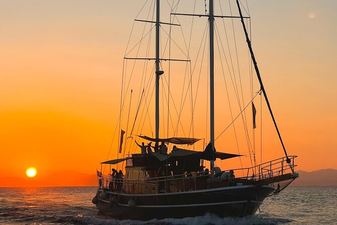 Sunset Dinner Cruise: Sunset, Swim, Drinks, and Dinner Onboard - Route and Stops: Athens Riviera, Ydrousa, and Vouliagmeni