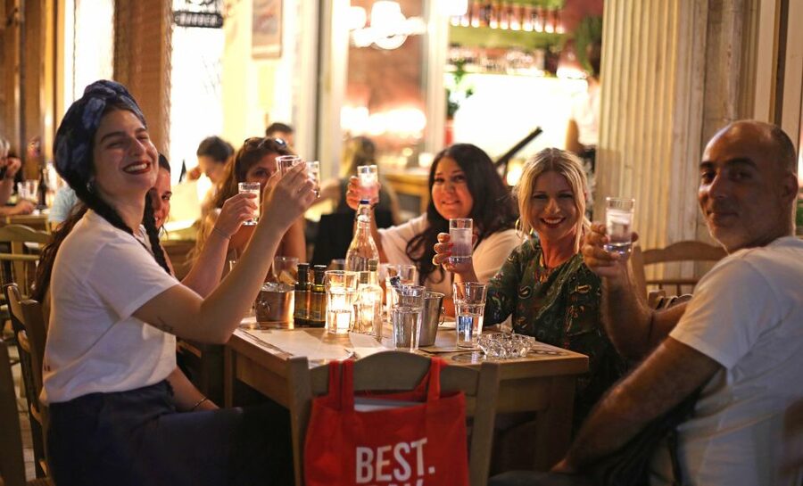 Twilight Athens Tour inc. rooftops, tastings & 3 drinks - Getting fed first: meze and local spirits early in the night